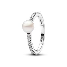 Embrace cool tones with the Pandora Timeless Treated Freshwater Cultured Pearl & Pavé Ring in sterling silver. This classic piece features a squared band with a concave section, showcasing a treated freshwater cultured pearl surrounded by sparkling cubic zirconia Pavé. Each unique pearl symbolizes beauty, wisdom, and love, making this ring a perfect addition to the Pandora Timeless collection. Please note each treated freshwater cultured pearl is unique and can vary in size and colour; normal wear and tear may occur with this material. Our freshwater cultured pearls are treated with bleaching and lustre enhancement. Pandora Pearl, Pandora Ring, Bracelet Tennis, Zierlicher Ring, Engagement Rings Bridal Sets, Engagement Ring Guide, Pandora Rings, Bridal Ring Sets, Pave Ring