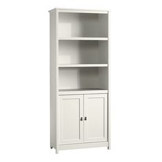 a white bookcase with two doors and drawers