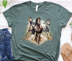 "Horse Shirt, Running Watercolor Horses Tshirt, Horse Gifts, Horse Racing, Horse Art, Horse Owner Gift, Wild Horse Shirt, Horse Hair Shirt I can do it on sweatshirts hoodies and long sleeves if you want. Please don't hesitate to contact me. Hi there! I'm Daisy, the owner of DaisyTeeUS. I'm so glad to see you here. My priority is to make you happy with your purchase. Please contact me if you have any questions or want to get a custom-made design.You can also change the color of the design. I will Watercolor Horses, Racing Horse, Art Horse, Watercolor Horse, Horse Owner, Horse Shirt, Shirt Hair, Horse T Shirts, Horse Gifts