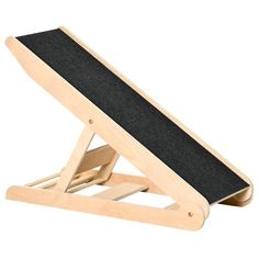 a wooden skateboard stand with black felt