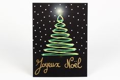 a card with a christmas tree on it