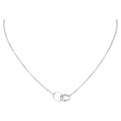 Cartier Baby Love Necklace In 18K White Gold. This Necklace Has 2 interlocking Love Rings On A 16" Chain. SN. FO3604 Cartier Love Necklace White Gold, White Gold Jewelry Aesthetic, White Gold Jewelry Necklaces, Cartier Love Necklace, Accessories Png, Sliver Necklace, Love Rings, Cartier Necklace, Necklace White Gold