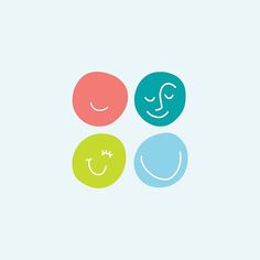 three different colored circles with faces drawn on them, one is smiling and the other has a