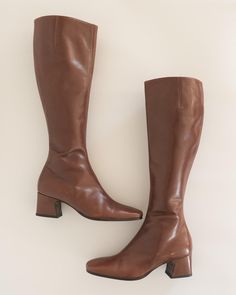 Mahogany brown knee high boots c. 1990s DKNY. Square toe. 2 inch stacked heel. Inner zipper. composition: 100% leather label: DKNY (early bold label) made in Italy condition: excellent - a few minor scuffs, sole has almost no wear tag size: 6 MEASUREMENTS length (inner sole) - 9" length (outer sole) - 9.5" width (outer sole) - 3.125" shaft - 16" heel - 2" all sales final - please review our shop policies prior to purchase 90s Boots, Brown Knee High Boots, Mahogany Brown, Equestrian Boots, Equestrian Riding, Tall Leather Boots, Leather Label, 90s 00s, Stacked Heel