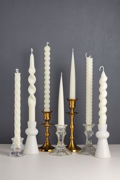 a group of candles sitting next to each other