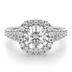 a round brilliant cut diamond ring with double halos