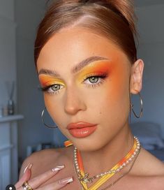 Luau Makeup Ideas Hawaii, Orange Make Up Looks Creative, Orange And Yellow Makeup Looks, Sun Set Makeup Look, Bird Inspired Makeup, Orange Festival Makeup, Hawaii Makeup Look, Yellow Orange Makeup, Hawaiian Makeup Look