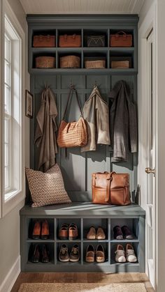 a coat rack with shoes and purses on it