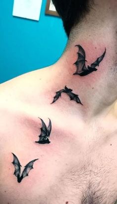 a man's chest with bats on it