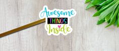 a sticker that says awesome things inside