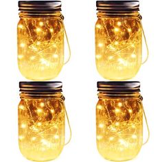 three mason jars filled with yellow lights and string lights on the top one is empty