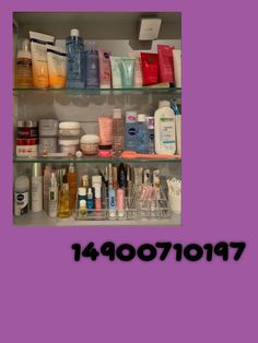 a shelf filled with lots of different types of cosmetics and personal care products on it