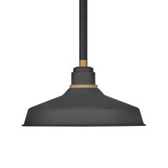 an industrial style pendant light with a black metal finish and gold trim on the top