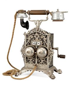 an old fashioned phone with two bells attached to it