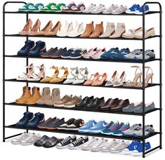 the shoe rack is filled with many pairs of shoes