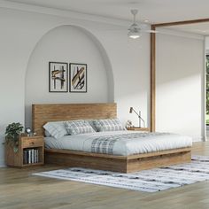 a bed sitting in the middle of a bedroom next to a wooden table and chair