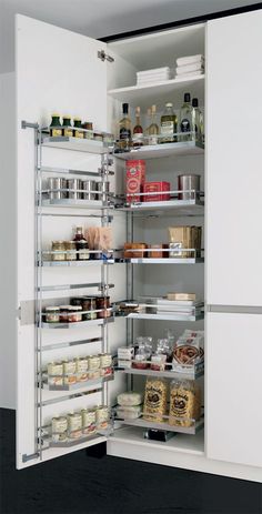 an open refrigerator door with food and condiments in it