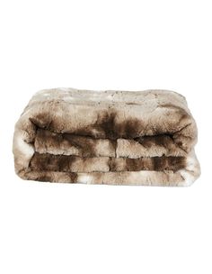 a brown and white fur blanket on a white background