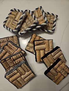 several pieces of wine cork sitting on top of a white counter next to each other