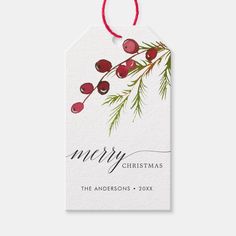 a christmas gift tag with red berries on it