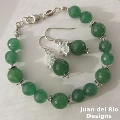 Lucky jade, lucky clover, lucky stars ... This is a one of a kind set of bracelet and dangling earrings with emerald green faceted Jade.  The beads of the bracelet measure 8 mm and 10 mm in diameter, the jade of the earrings is 10 mm in size. With 2 mm silver round beads and 5 mm solid silver decorative beads, that have the form of little stars and are partly oxidized.  And there are two lucky clover charms of 10 mm in size, these have a silky matte surface in the front and on the back they are somewhat corrugated. The total length of the bracelet is approx. 19 cm - 7 1/2 inch, therefore suitable for a small or medium wrist. Strung on supple nylon-coated stainless steel beading wire, the bracelet drapes gently around the wrist. The earrings are 3.3 cm long - 1 1/4 inch, including the ear h Handmade Aventurine Round Bead Jewelry, Silver Emerald Bracelet Jewelry, Sterling Silver Round Beads Fine Jewelry, Aventurine Round Beads For Jewelry Making, Aventurine Gemstone Beads Jewelry For Gift, Aventurine Gemstone Beads Jewelry As Gift, Nickel-free Round Jade Jewelry, Nickel-free Spiritual Jewelry For May Birthstone, Good Luck Jewelry Bracelet With Natural Stones