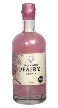 a bottle of sugar plum fairy syrup on a white background with the label below it