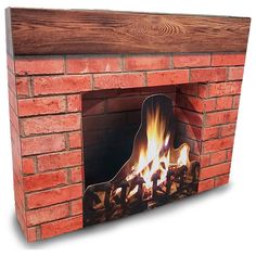 a brick fireplace with fire burning in it