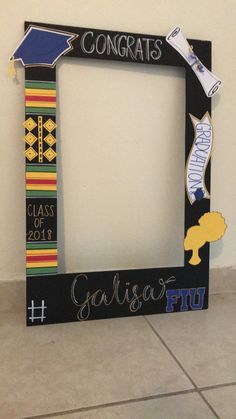 a graduation photo frame with the words congrats on it