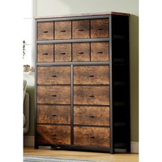 a large wooden dresser with drawers in a room