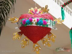 a heart shaped decoration hanging from the ceiling