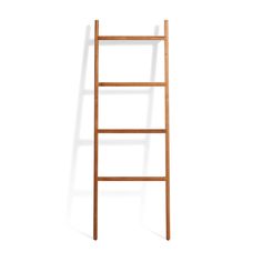 a wooden ladder against a white background