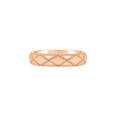 an 18k rose gold ring with diamonds