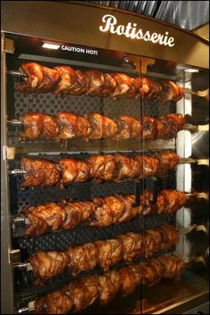 the meat is being cooked in the oven for sale at the store or other place