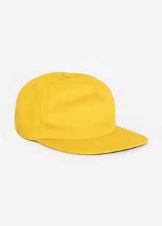 Poly Cotton Twill 5 Panel Hat in Gold Solid Color Snapback Hat With Flat Bill For Streetwear, Casual Solid Color Six-panel Snapback Hat, Casual Solid Snapback Hat With Flat Brim, Solid Color Cotton Hats For Streetwear, Everyday Solid Color Snapback Baseball Cap, Solid Color Flat Bill Baseball Cap For Outdoor, Yellow Cotton Trucker Hat With Curved Brim, Classic Solid Color Six-panel Trucker Hat, Basic Solid Six-panel Baseball Cap