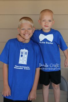 two young boys standing next to each other wearing blue shirts with the doctor on them