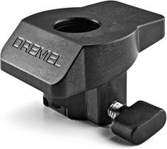 an image of a small black object with the word dremel written on it