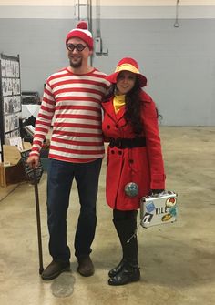 a man and woman dressed up in costumes