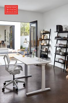 an office with a desk, chair and bookshelf in the background that says design within