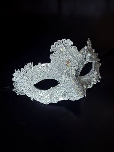 Women's brocade masquerade mask in silver, for masquerade balls and parties!   I N C L U D E D Masks come with matching double-sided satin ribbons attached. Men's Lightweight Mask  Women's Lightweight Lace Mask  S I Z E  Adult Size. Detailed dimensions available upon request. C U S T O M I Z A T I O N If you would like to color & embellish the mask to match your costume/dress, choose custom color and get in touch, we love to work on custom orders!  C O N T A C T  Please contact us via ETSY messages. P H O T O  Images displayed on this listing are property of www.higginscreek.com A B O U T HigginsCreek makes masquerade masks for couples, all uniquely customized to match your outfits! Thank you in advance for your order and support! Venetian Masquerade Party, Silver Masquerade Mask, Silver Mask, Metal Mask, Ball Mask, Female Mask, Venetian Masquerade, Ball Hairstyles, Lace Mask