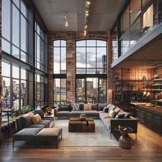 a living room filled with lots of furniture and large windows next to a tall building