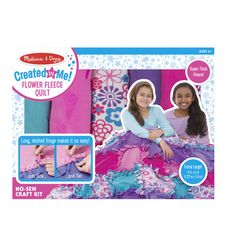 the crocheted me flower fleece quilt kit is shown in pink and blue