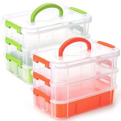 three plastic storage containers with lids and handles on each side, one containing an orange handle