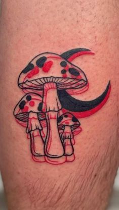 a mushroom tattoo on the leg