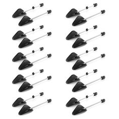 10 pairs of black plastic ear clips with white tips and metal pins on each side