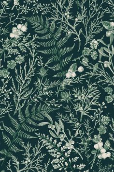 a green and white floral pattern on a black background