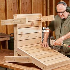 a man working on a piece of wood