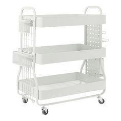 a three tiered white plastic medical cart