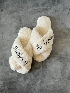 two white slippers with the words where's the green? written on them