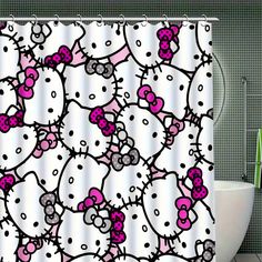 a shower curtain with hello kitty designs on it