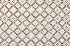 a brown and white checkered fabric with small squares